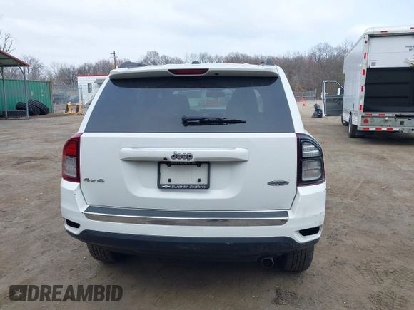 2016 Jeep Compass Latitude with VIN 1C4NJDEBXGD737018, listed as a IAAI auction lot 41800071 with 158,006 mi miles. Bid and sale history available at carsss.com. Image 16.