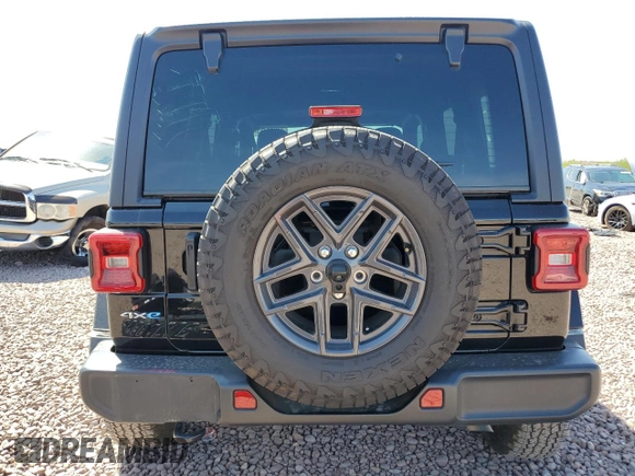 2021 Jeep Wrangler Unlimited Sahara with VIN 1C4JJXP69MW800920, listed as a Copart auction lot 52033745 with 49,173 mi miles and Salvage Title. Bid and sale history available at DreamBid. Image 6.