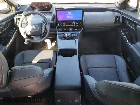 2023 Toyota bZ4X XLE with VIN JTMABACA9PA041997, listed as a Copart auction lot 52922215 with 6,490 mi miles and Salvage Title. Bid and sale history available at DreamBid. Image 8.