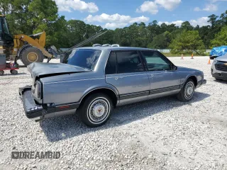 1991 Oldsmobile 88 z VIN 1G3HY54C4MH336805, wystawiony jako Copart lot #73367654 z przebiegiem 168 436 mil mil oraz Szkoda całkowita • Salvage title. Historia ofert i sprzedaży dostępna na DreamBid. Obrazek 3.
