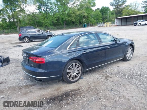 2015 Audi A8 4.0T with VIN WAU32AFD4FN002477, listed as a IAAI auction lot 42157514 with 151,729 mi miles and . Bid and sale history available at DreamBid. Image 4.