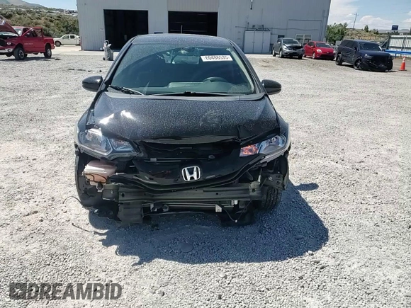 2015 Honda Fit LX z VIN 3HGGK5H52FM759746, wystawiony jako Copart lot #60486535 z przebiegiem 64 295 mil mil oraz Szkoda całkowita • Salvage title. Historia ofert i sprzedaży dostępna na DreamBid. Obrazek 13.