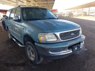 1997 Ford Expedition XLT z VIN 1FMFU18L4VLA72050, wystawiony jako IAAI lot #41303199 z przebiegiem 245 454 mil mil oraz . Historia ofert i sprzedaży dostępna na DreamBid. Obrazek 1.