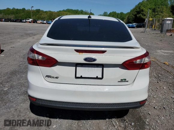 2013 Ford Focus SE z VIN 1FADP3F24DL128940, wystawiony jako Copart lot #54798665 z przebiegiem Nie podano mil oraz Tytuł czysty. Historia ofert i sprzedaży dostępna na DreamBid. Obrazek 6.