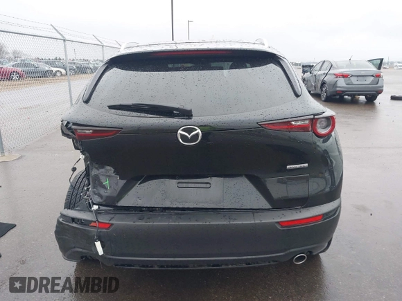 2025 Mazda CX-30 S Carbon Edition z VIN 3MVDMBCM9SM783429, wystawiony jako IAAI lot #42065729 z przebiegiem 4 940 mil mil oraz . Historia ofert i sprzedaży dostępna na DreamBid. Obrazek 16.