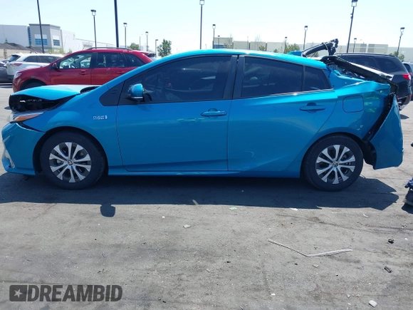 2021 Toyota Prius LE with VIN JTDKAMFP7M3169633, listed as a IAAI auction lot 41986170 with 55,925 mi miles and . Bid and sale history available at DreamBid. Image 15.