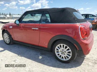 2016 MINI Convertible S with VIN WMWWG9C51G3A92388, listed as a Copart auction lot 43527125 with 144,454 mi miles and Salvage Title. Bid and sale history available at DreamBid. Image 2.