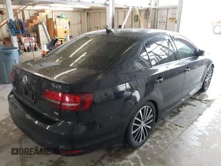 2016 Volkswagen Jetta Sport z VIN 3VWD17AJ0GM283938, wystawiony jako IAAI lot #41861923 z przebiegiem 118 418 mil mil oraz . Historia ofert i sprzedaży dostępna na DreamBid. Obrazek 4.