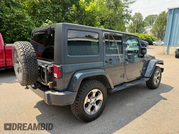 2016 Jeep Wrangler Unlimited Sahara with VIN 1C4BJWEG9GL169490, listed as a Copart auction lot 61507025 with 198,602 mi miles and Clean title. Bid and sale history available at DreamBid. Image 4.