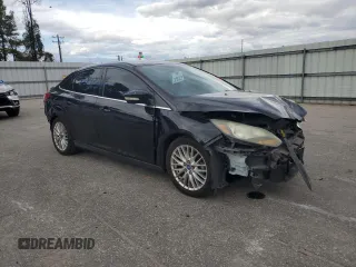 2014 Ford Focus Titanium with VIN 1FADP3J22EL221898, listed as a Copart auction lot 47867325 with 97,806 mi miles and Salvage Title. Bid and sale history available at DreamBid. Image 4.