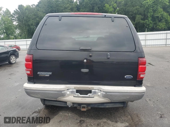 2002 Ford Expedition Eddie Bauer with VIN 1FMPU18LX2LA39571, listed as a Copart auction lot 58774915 with 388,886 mi miles and Salvage title. Bid and sale history available at DreamBid. Image 6.