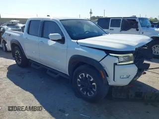 2022 Nissan Frontier SV z VIN 1N6ED1EJ2NN685935, wystawiony jako IAAI lot #41859677 z przebiegiem 33 153 mil mil oraz . Historia ofert i sprzedaży dostępna na DreamBid. Obrazek 1.