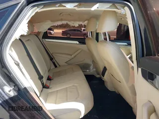2019 Volkswagen Passat 2.0T Wolfsburg Edition with VIN 1VWLA7A30KC009646, listed as a IAAI auction lot 39842320 with 101,006 mi miles. Bid and sale history available at carsss.com. Image 8.