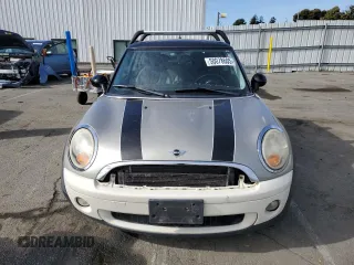 2010 MINI Hardtop with VIN WMWMF3C57ATU77370, listed as a Copart auction lot 50078605 with 187,187 mi miles and Salvage title. Bid and sale history available at DreamBid. Image 5.