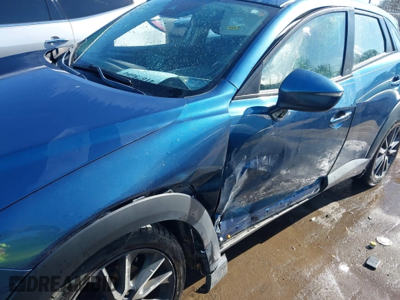 2018 Mazda CX-3 Touring z VIN JM1DKFC73J0301449, wystawiony jako IAAI lot #41678604 z przebiegiem 105 249 mil mil oraz . Historia ofert i sprzedaży dostępna na DreamBid. Obrazek 6.