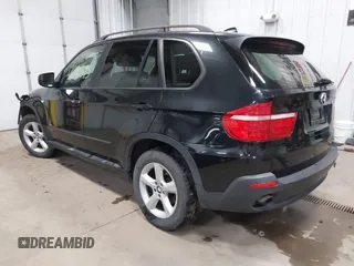 2008 BMW X5 3.0si with VIN 5UXFE43528L001685, listed as a IAAI auction lot 41890395 with 189,724 mi miles. Bid and sale history available at carsss.com. Image 3.