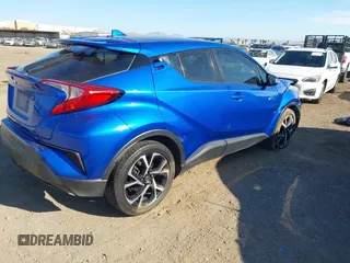 2018 Toyota C-HR XLE z VIN NMTKHMBXXJR007134, wystawiony jako IAAI lot #42004283 z przebiegiem 174 336 mil mil oraz . Historia ofert i sprzedaży dostępna na DreamBid. Obrazek 4.