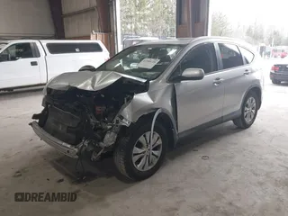 2013 Honda CR-V EX-L with VIN 2HKRM3H70DH509027, listed as a IAAI auction lot 41900728 with 90,819 mi miles and . Bid and sale history available at DreamBid. Image 2.