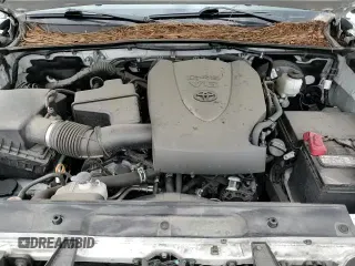 2020 Toyota Tacoma SR с VIN 5TFSZ5AN6LX215576, выставлен на аукционе Copart как лот 69140655 с пробегом 57 176 миль миль и Списание • Salvage title. История ставок и продаж доступна на DreamBid. Изображение 13.