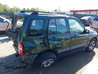 2001 Suzuki Vitara JX z VIN 2S3TD52V416109787, wystawiony jako IAAI lot #42126699 z przebiegiem Nie podano mil oraz . Historia ofert i sprzedaży dostępna na DreamBid. Obrazek 14.