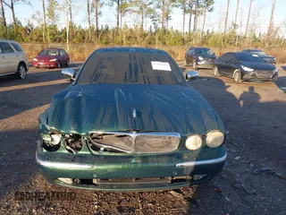 2007 Jaguar XJ VDP with VIN SAJWA82C37TH14330, listed as a IAAI auction lot 41316658 with 59,745 mi miles. Bid and sale history available at carsss.com. Image 12.