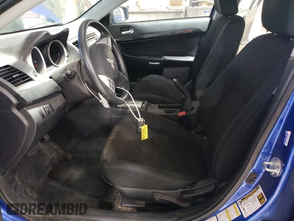 2017 Mitsubishi Lancer ES with VIN JA32V2FW1HU000514, listed as a Copart auction lot 82189384 with 111,642 mi miles and Salvage Title. Bid and sale history available at carsss.com. Image 7.