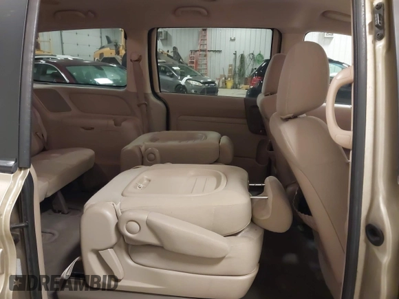 2009 Kia Sedona LX with VIN KNDMB233996314804, listed as a IAAI auction lot 42014187 with 220,693 mi miles and . Bid and sale history available at DreamBid. Image 8.