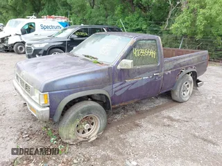 1995 Nissan Frontier XE with VIN 1N6SD11Y4SC318791, listed as a IAAI auction lot 42335599 with Not provided miles and . Bid and sale history available at DreamBid. Image 2.