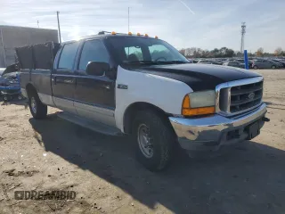 2001 Ford Super Duty F-250 XL with VIN 1FTNW20L11ED23827, listed as a Copart auction lot 82335324 with 223,835 mi miles and Salvage Title. Bid and sale history available at carsss.com. Image 4.