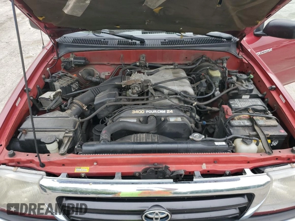 1999 Toyota Tacoma z VIN 4TAWN72N1XZ484114, wystawiony jako Copart lot #60478265 z przebiegiem 209 308 mil mil oraz Szkoda całkowita • Salvage title. Historia ofert i sprzedaży dostępna na DreamBid. Obrazek 11.