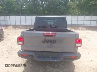 2023 Jeep Gladiator Sport S с VIN 1C6HJTAG7PL522721, выставлен на аукционе IAAI как лот 42594463 с пробегом 64 702 миль миль и . История ставок и продаж доступна на DreamBid. Изображение 16.