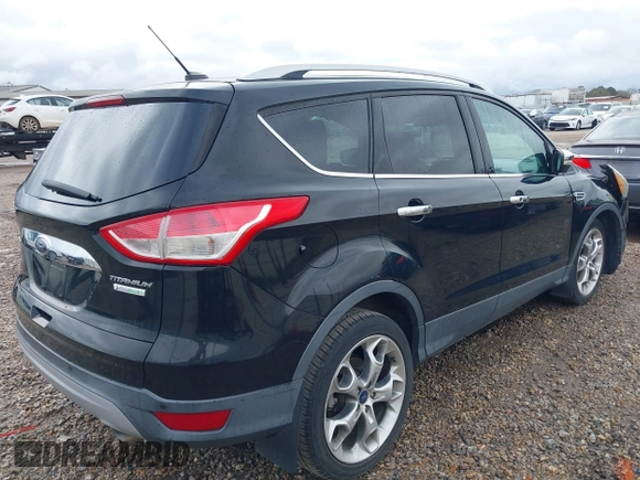 2016 Ford Escape Titanium with VIN 1FMCU0JX8GUA49619, listed as a IAAI auction lot 41743116 with 53,456 mi miles. Bid and sale history available at carsss.com. Image 4.