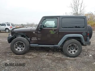 2013 Jeep Wrangler Sport with VIN 1C4AJWAG5DL679350, listed as a IAAI auction lot 40893582 with 61,191 mi miles and . Bid and sale history available at carsss.com. Image 14.