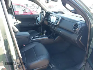2021 Toyota Tacoma SR with VIN 3TMCZ5AN7MM395940, listed as a IAAI auction lot 41240832 with 39,338 mi miles and . Bid and sale history available at DreamBid. Image 5.