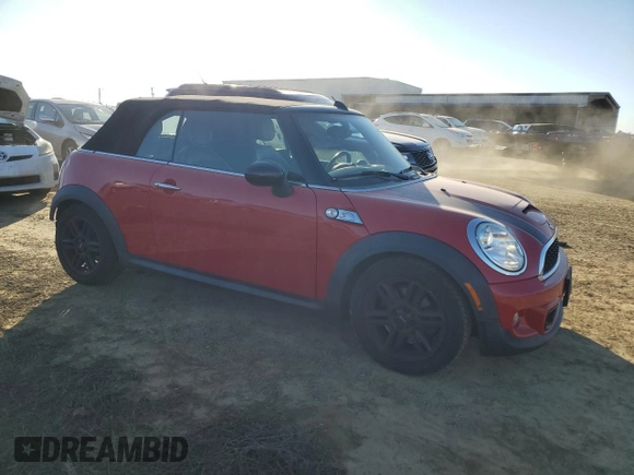 2014 MINI Convertible S with VIN WMWZP3C54ET298129, listed as a Copart auction lot 88523065 with 54,788 mi miles and Salvage title. Bid and sale history available at DreamBid. Image 4.