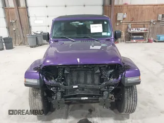 2023 Jeep Wrangler Sahara with VIN 1C4HJXEN9PW560958, listed as a IAAI auction lot 41980179 with 35,975 mi miles and . Bid and sale history available at DreamBid. Image 13.