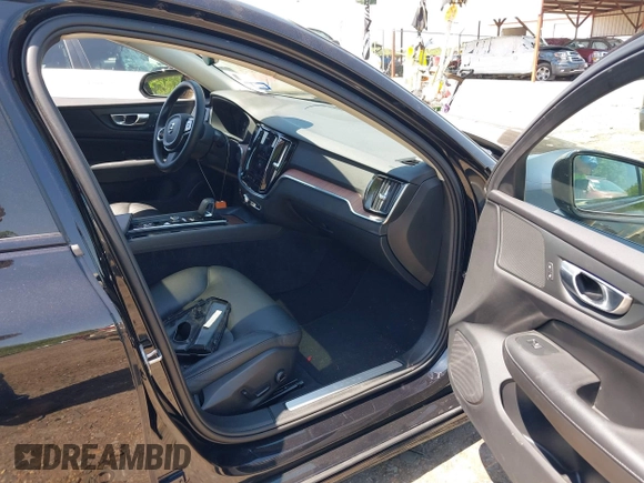 2024 Volvo S60 Plus Dark Theme with VIN 7JRL12FL8RG295345, listed as a IAAI auction lot 41989830 with 38,817 mi miles. Bid and sale history available at carsss.com. Image 5.