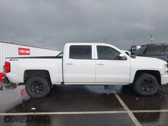 2018 Chevrolet Silverado 1500 LT with VIN 3GCUKREC5JG595959, listed as a IAAI auction lot 41608507 with 117,824 mi miles. Bid and sale history available at carsss.com. Image 13.