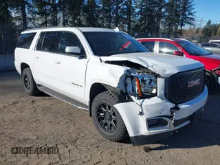 2019 GMC Yukon XL SLE z VIN 1GKS2FKC9KR147823, wystawiony jako IAAI lot #41571738 z przebiegiem 95 764 mil mil oraz . Historia ofert i sprzedaży dostępna na DreamBid. Obrazek 1.