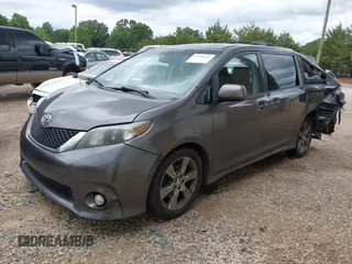 2012 Toyota Sienna SE with VIN 5TDXK3DC2CS235211, listed as a IAAI auction lot 42390354 with 242,602 mi miles and . Bid and sale history available at DreamBid. Image 2.