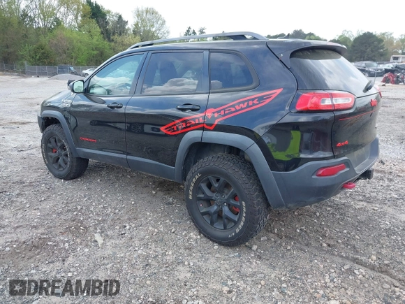 2015 Jeep Cherokee Trailhawk with VIN 1C4PJMBS5FW792184, listed as a IAAI auction lot 41827106 with 132,752 mi miles. Bid and sale history available at carsss.com. Image 3.