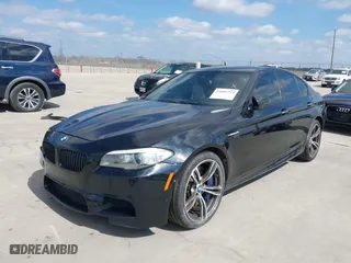 2013 BMW M5 with VIN WBSFV9C54DD095547, listed as a IAAI auction lot 41601733 with 1 mi miles. Bid and sale history available at carsss.com. Image 2.