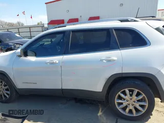 2016 Jeep Cherokee Limited with VIN 1C4PJLDB8GW256788, listed as a IAAI auction lot 41657339 with 104,630 mi miles. Bid and sale history available at carsss.com. Image 14.