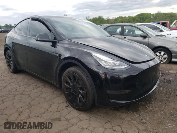 2022 Tesla Model Y Long Range z VIN 7SAYGDEEXNA008898, wystawiony jako Copart lot #54915445 z przebiegiem 35 467 mil mil oraz Szkoda całkowita • Salvage title. Historia ofert i sprzedaży dostępna na DreamBid. Obrazek 4.