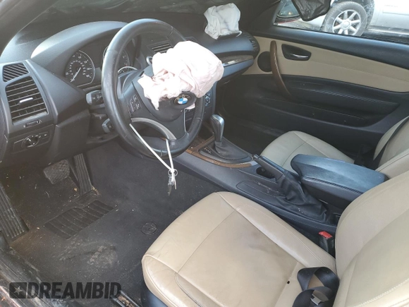 2010 BMW 1 Series 128i with VIN WBAUL7C54AVJ77712, listed as a Copart auction lot 83158294 with Not provided miles and Salvage title. Bid and sale history available at DreamBid. Image 8.