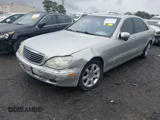 2002 Mercedes-Benz S-Class 5.0L with VIN WDBNG75J32A241980, listed as a IAAI auction lot 41971627 with 160,634 mi miles. Bid and sale history available at carsss.com. Image 17.