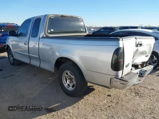 1999 Ford F-150 with VIN 1FTZX1729XKA58767, listed as a IAAI auction lot 41392815 with 342,029 mi miles and . Bid and sale history available at DreamBid. Image 3.