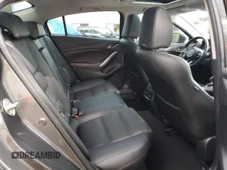 2017 Mazda 6 Grand Touring с VIN JM1GL1W55H1140064, выставлен на аукционе Copart как лот 57503425 с пробегом 74 304 миль миль и Списание • Salvage title. История ставок и продаж доступна на DreamBid. Изображение 10.