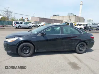 2015 Toyota Camry LE with VIN 4T1BD1FKXFU164963, listed as a IAAI auction lot 42132724 with 141,089 mi miles and . Bid and sale history available at DreamBid. Image 14.