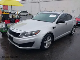 2011 Kia Optima LX with VIN KNAGM4A7XB5169810, listed as a IAAI auction lot 40855136 with 147,541 mi miles. Bid and sale history available at carsss.com. Image 2.